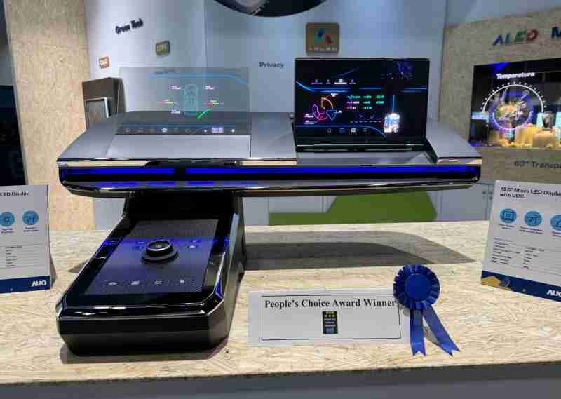 人生就是博车用Micro LED Display HMI解决方案获”最佳车用显示奖”，，以用户为中心开发，，针对前座驾驶与乘客设计兼具娱乐与安全的高画质屏幕，，，包含车舱前座的Micro LED透明屏幕及全球首款内建镜头的智慧Micro LED显示器